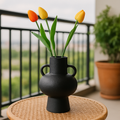 Decorative two-tone ceramic vase in black and white finish