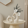 White ceramic vase in Scandinavian Nordic design
