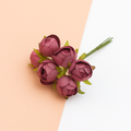 Decorative silk rose bouquet in vase for home decor