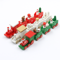 handcrafted wooden train with Christmas theme
