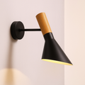 black slantnose wall light for modern architectural decor